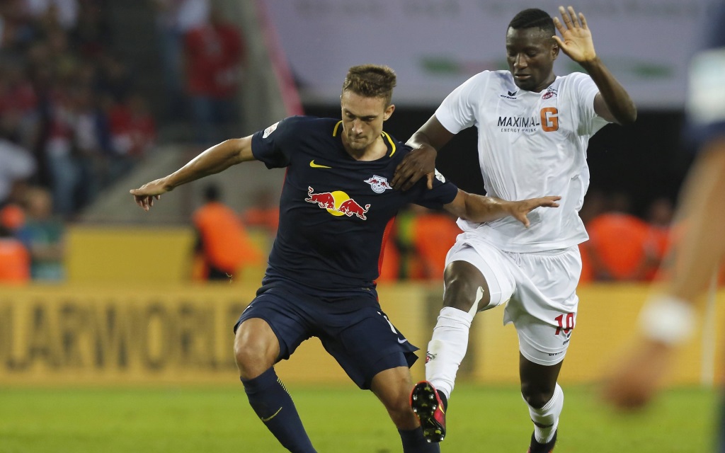 Stefan Ilsanker im Laufduell mit Sehrou Guirassy im Spiel 1.FC Köln - RB Leipzig in der Saison 2016/17