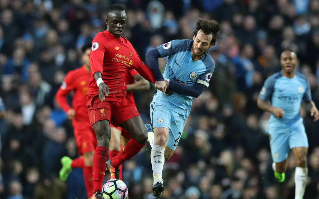 Imago/Sportimage: Liverpools Mane (l.) und Citys Silva (r.) werden sich auch am Samstag nichts schenken.