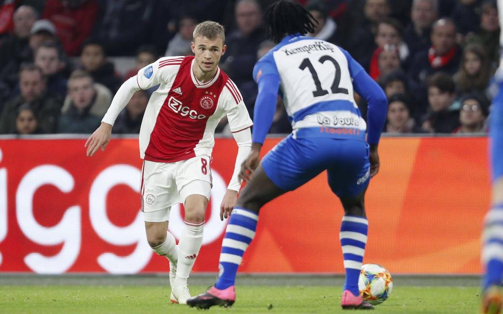 Daley Sinkgraven of Ajax, Myenty Abena of De Graafschap during the Dutch Eredivisie match between Ajax Amsterdam and De Graafschap at the Johan Cruijff Arena on December 16, 2018 in Amsterdam,
