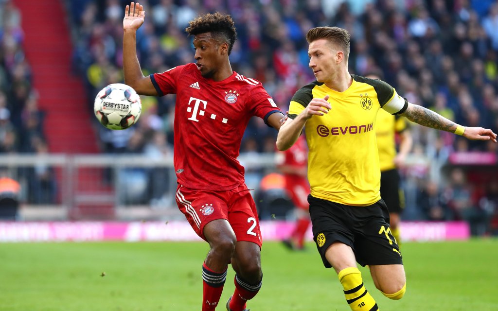 Samstag 06.04.2019, Saison 2018/2019, 1. Bundesliga, 28. Spieltag in der Allianz-Arena, FC Bayern München - BVB 09 Borussia Dortmund, Kingsley Coman (FCB) gegen Marco Reus (BVB)